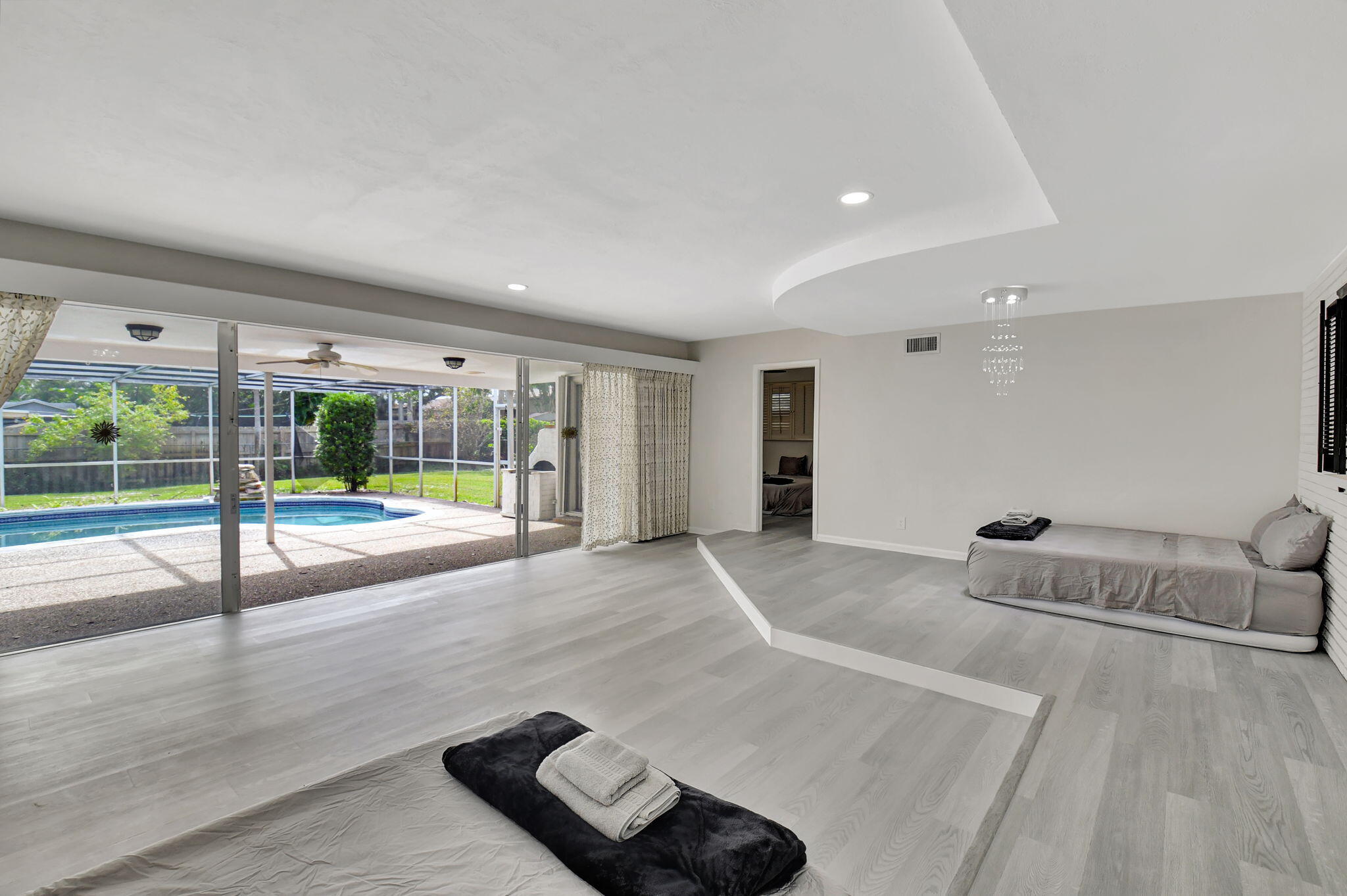 410 Spanish River Boulevard Boca Raton, FL 33431 - Photo 6 of 26 a living room with couch and a table