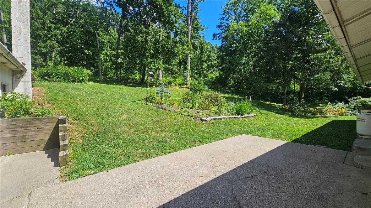 2529 Ringhoffer Road Hellertown, PA 18055 - Photo 20 of 33 A verdant backyard retreat provides a serene backdrop with ample green space.