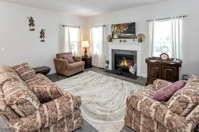 a bedroom with a bed and a fireplace