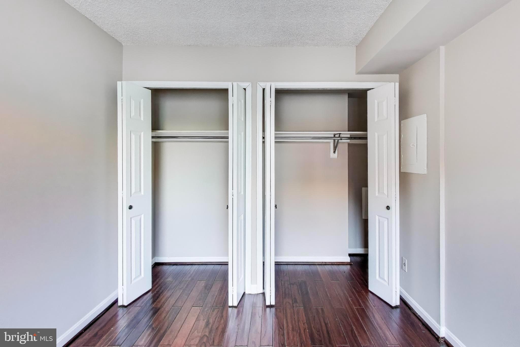 1245 13th Street Northwest, Unit 208 Washington, DC 20005 - Photo 16 of 19 a view of empty room with wooden floor