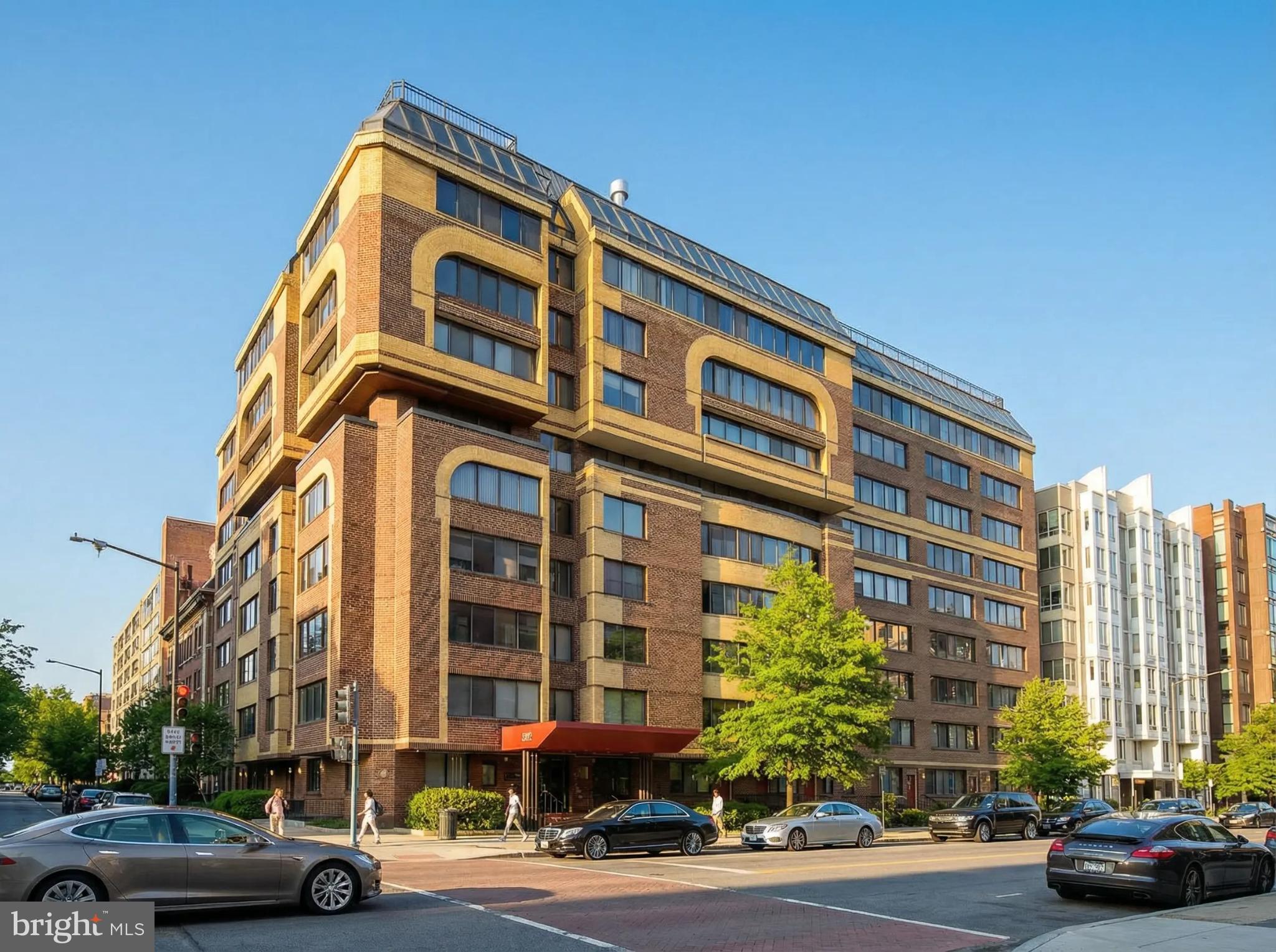1245 13th Street Northwest, Unit 208 Washington, DC 20005 - Photo 2 of 19 a front view of a building and car parked