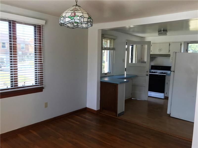 The kitchen is open to the Dining Room.