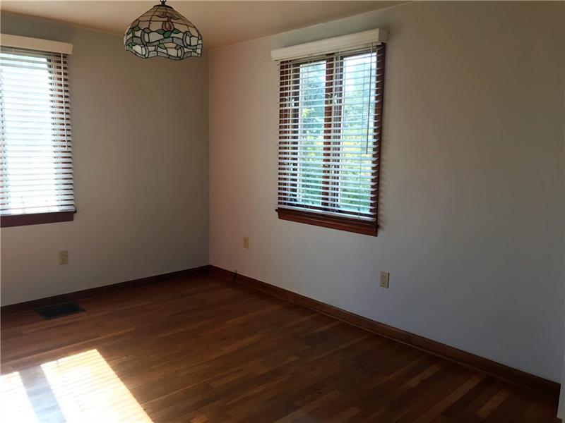 In the Dining Room you will find plenty of light comes through the windows!