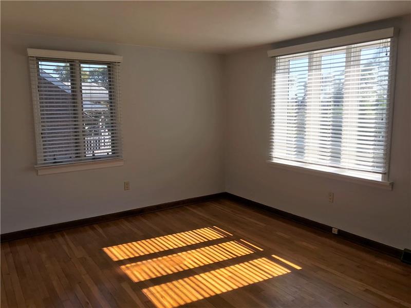 198 Seavey Road Pittsburgh, PA 15223 - Photo 10 of 18 Also in the Living Room, you find large windows allowing for natural light!