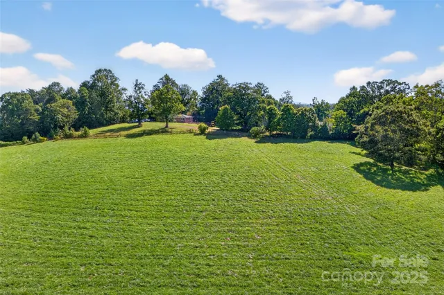 a view of a golf course with a lake