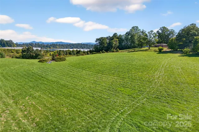 a view of a golf course with a lake