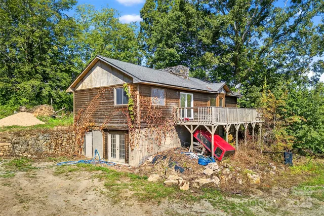 a aerial view of a house with a yard