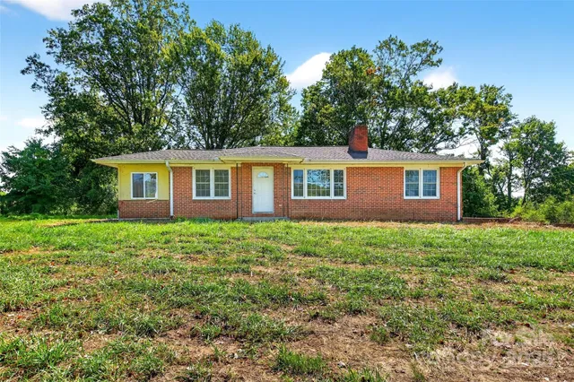a view of a backyard with plants