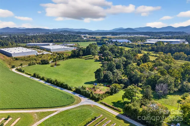 a view of a city with mountains in the background