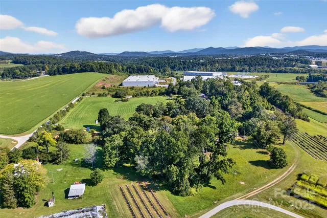 a view of a city with mountains in the background