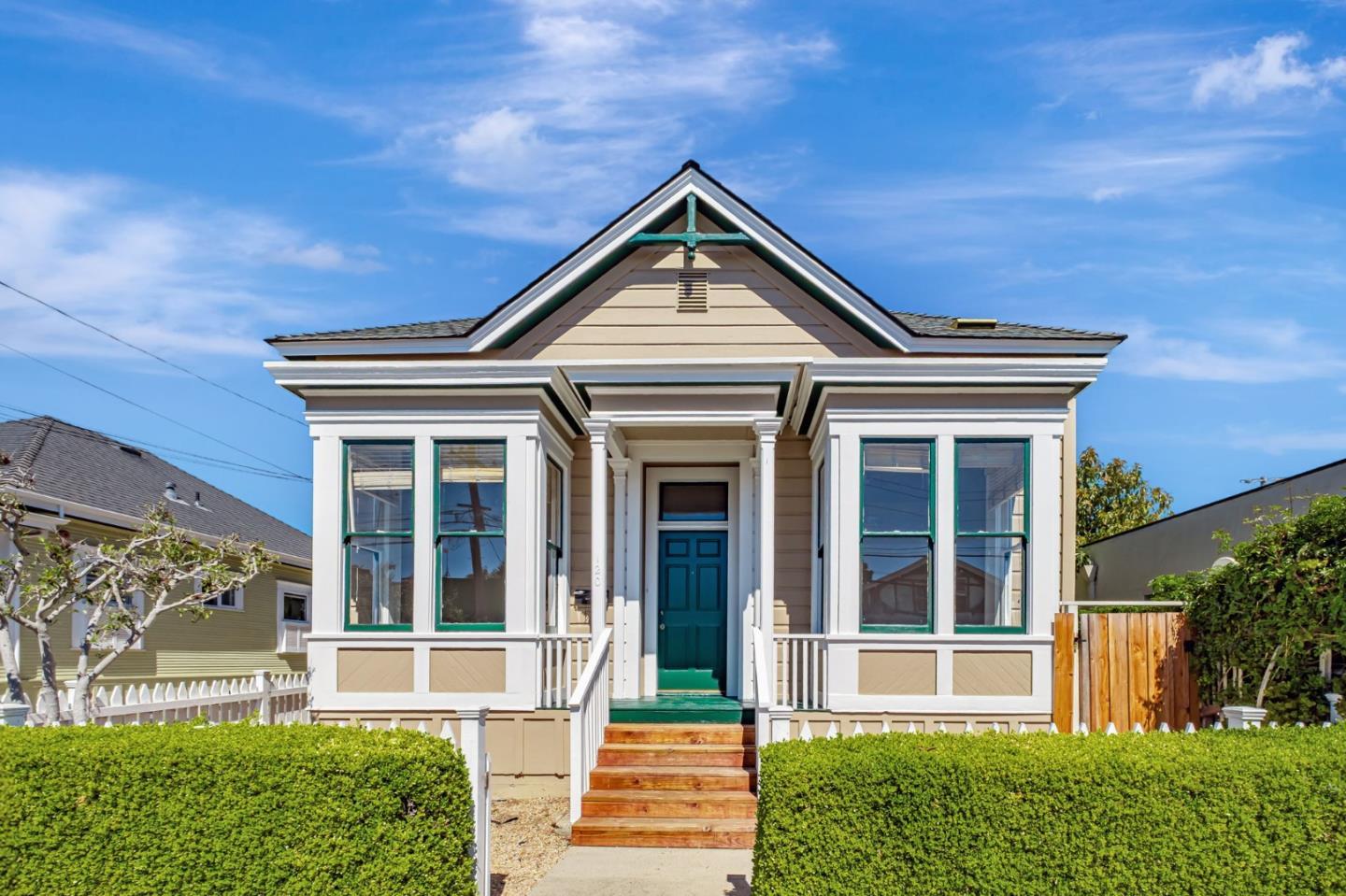 120 Maple Street Santa Cruz, CA 95060 - Photo 1 of 28 a front view of a house with a yard