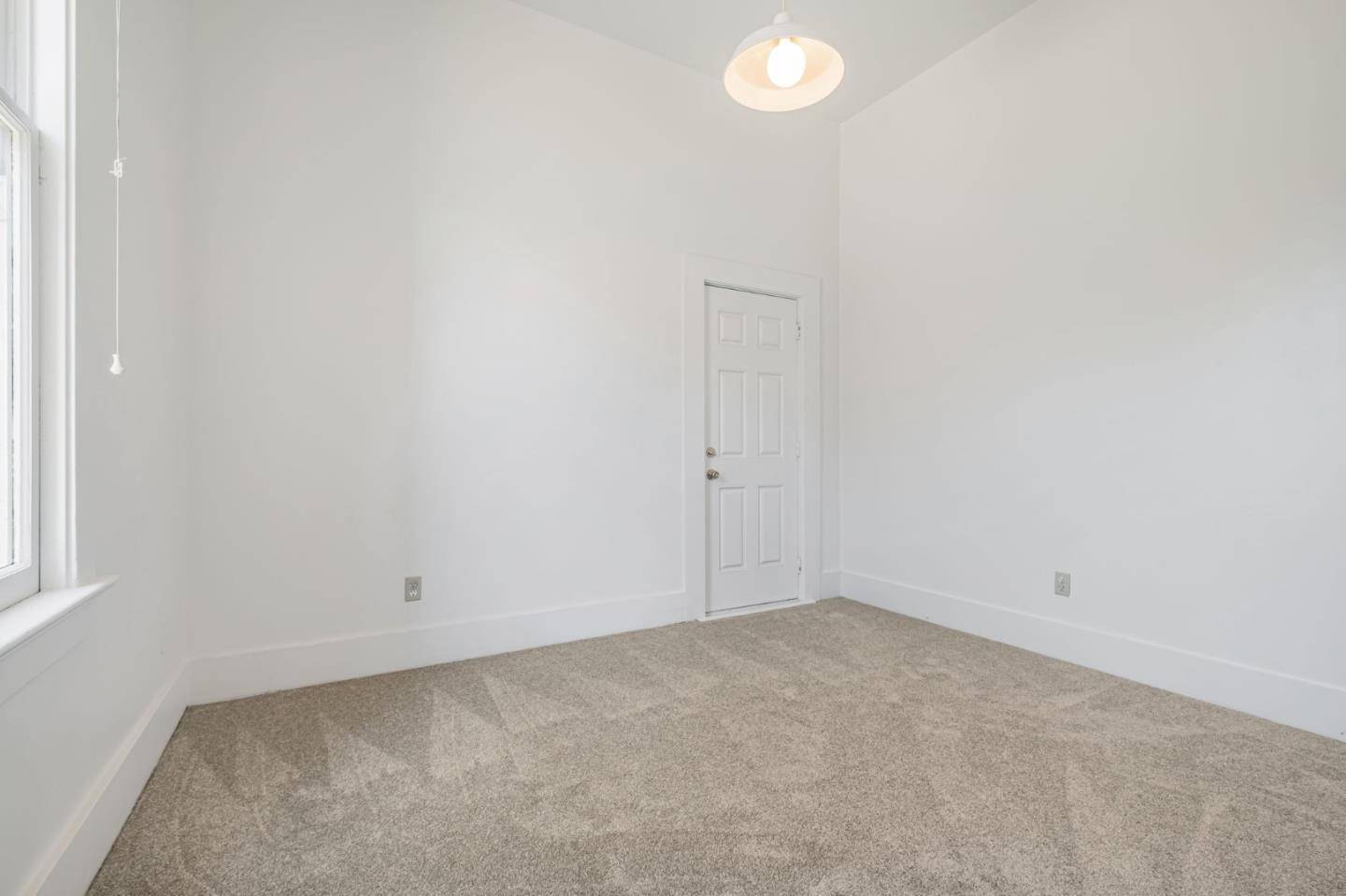 120 Maple Street Santa Cruz, CA 95060 - Photo 19 of 28 an empty room with a window