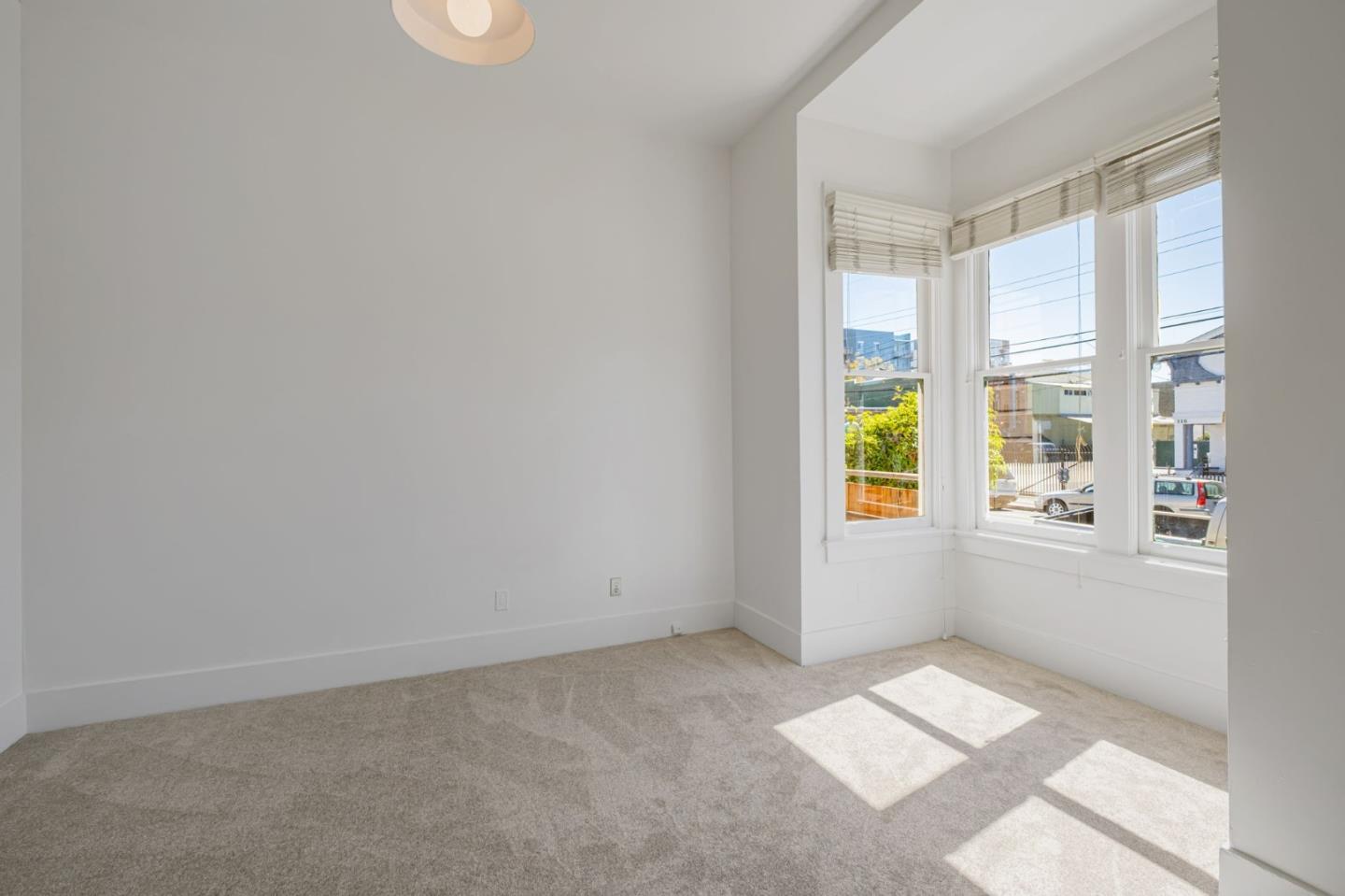 120 Maple Street Santa Cruz, CA 95060 - Photo 6 of 28 a view of an empty room with a window