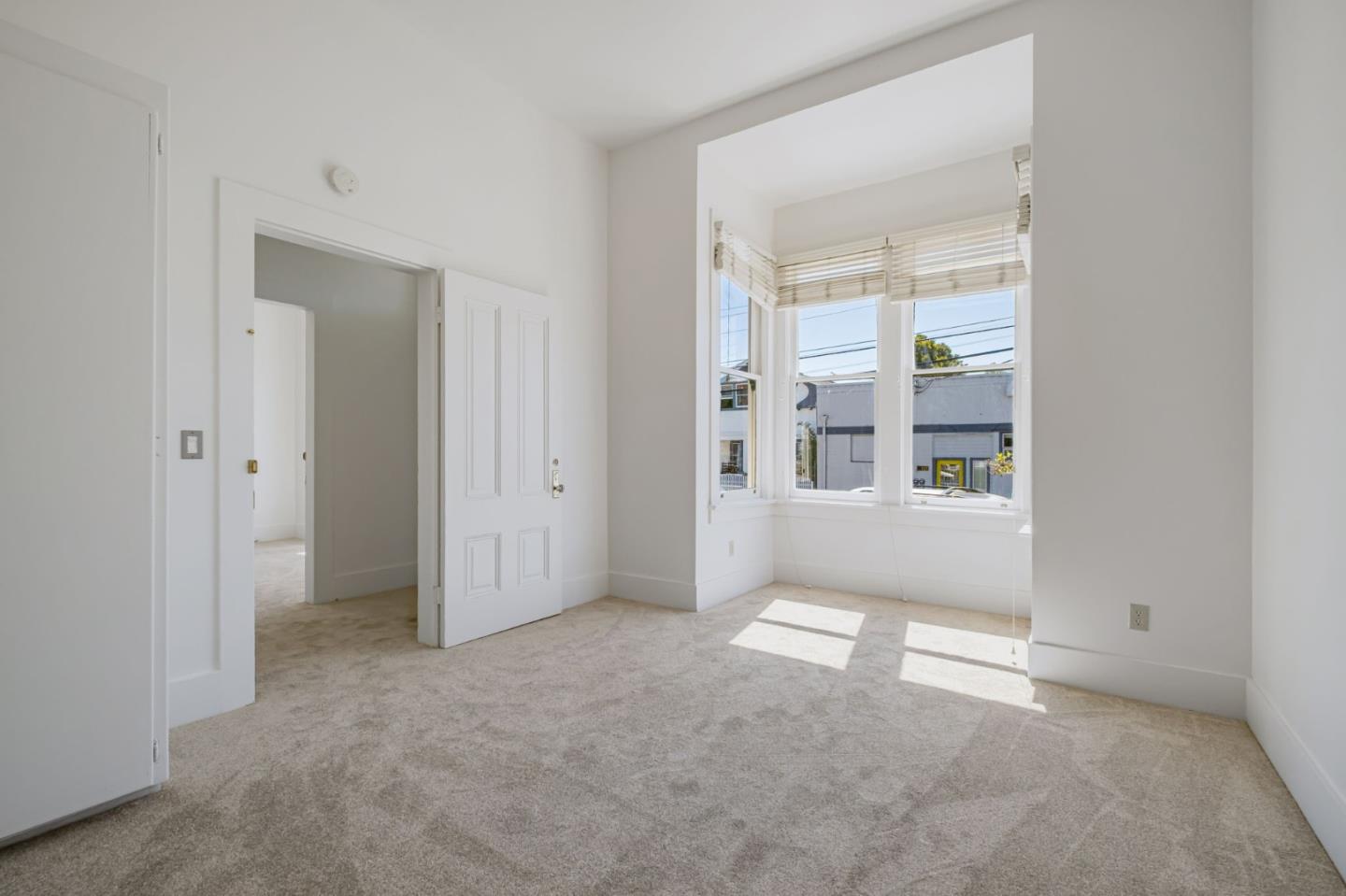 120 Maple Street Santa Cruz, CA 95060 - Photo 9 of 28 an empty room that has a window in it