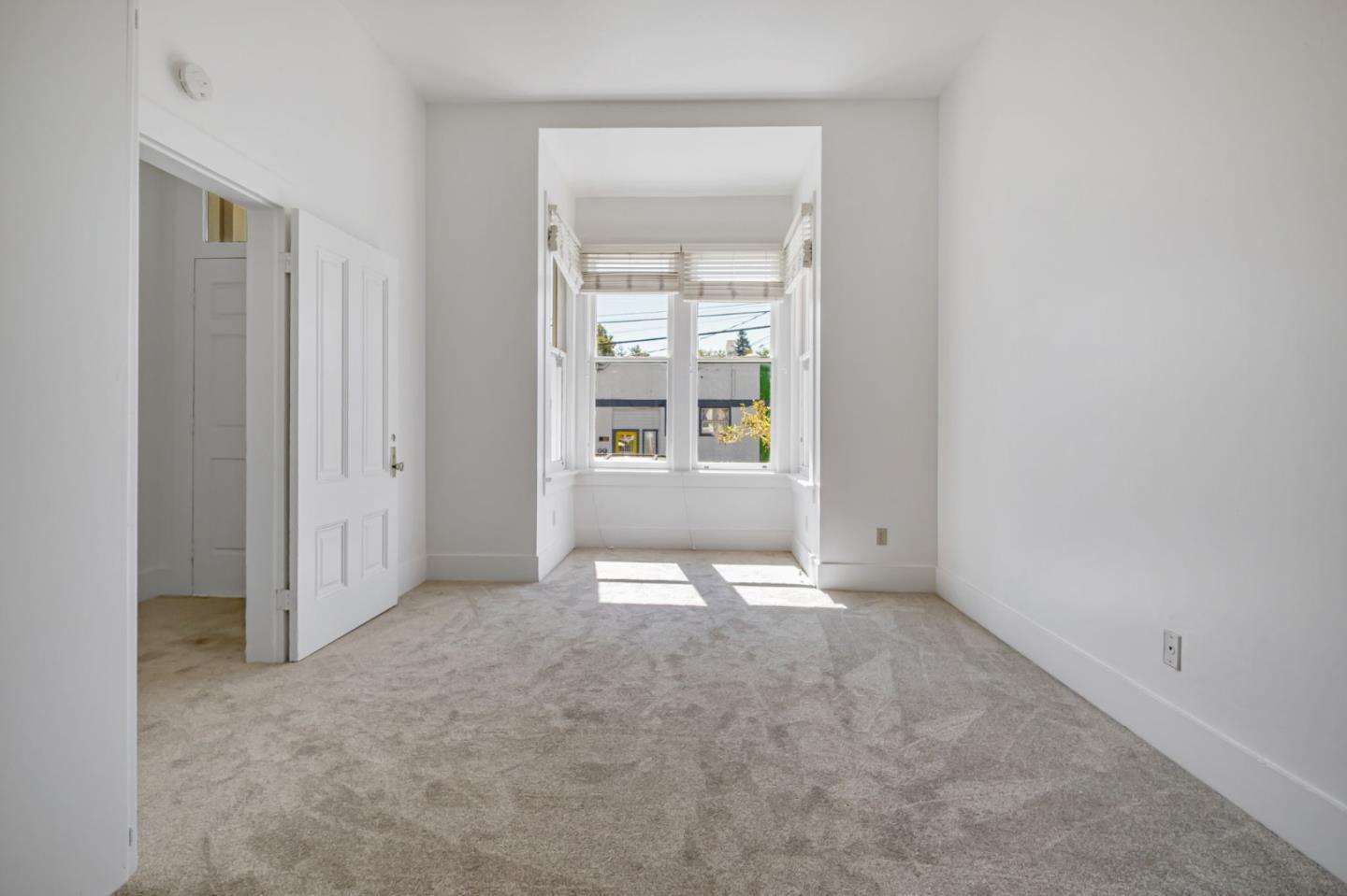 120 Maple Street Santa Cruz, CA 95060 - Photo 10 of 28 an empty room with windows