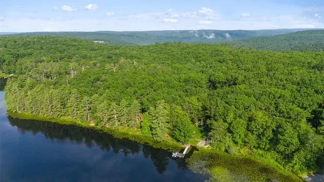 a view of a lake with a yard