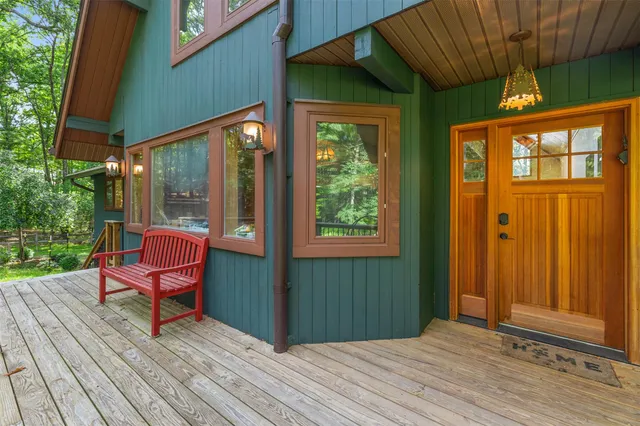 a view of a chairs on the roof deck