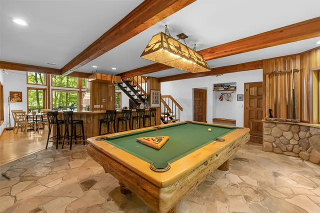 a room with lots of tables and chairs