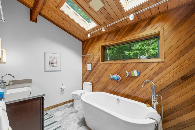 a bathroom with a sink and bathtub
