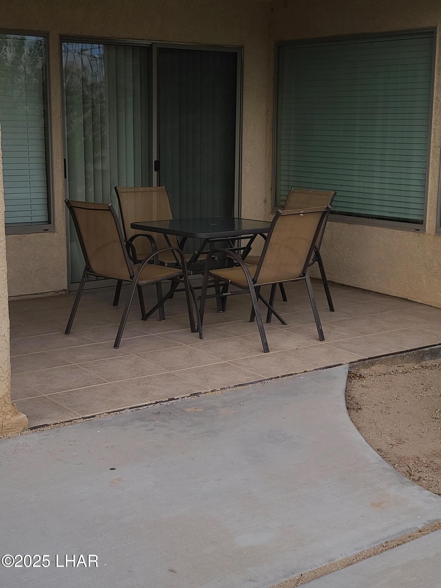 94 London Bridge Road, Unit 108 Lake Havasu City, AZ 86403 - Photo 8 of 38 a view of outdoor space with furniture