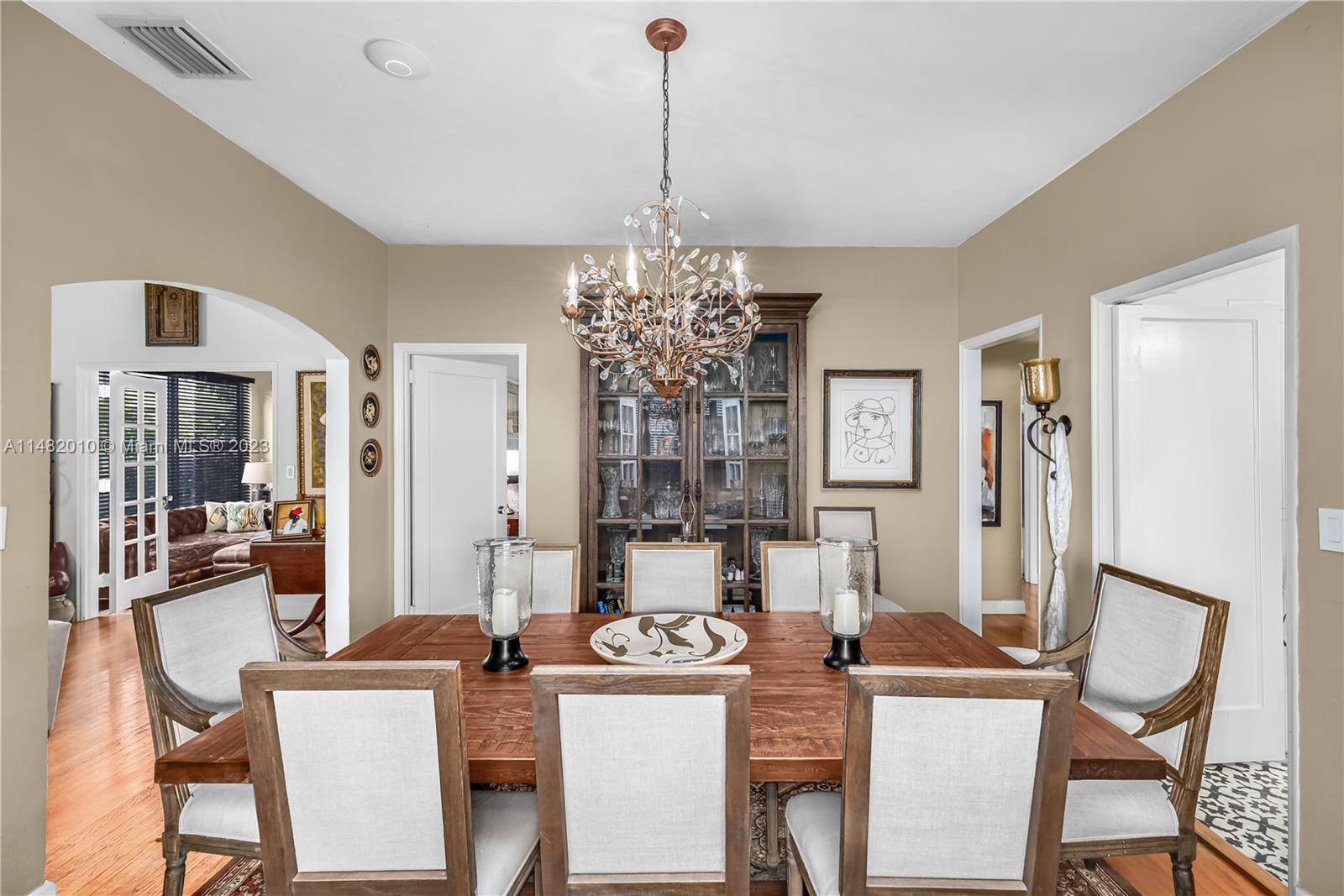 28 Southwest 26th Road Miami, FL 33129 - Photo 12 of 38 a view of a dining room with furniture and chandelier