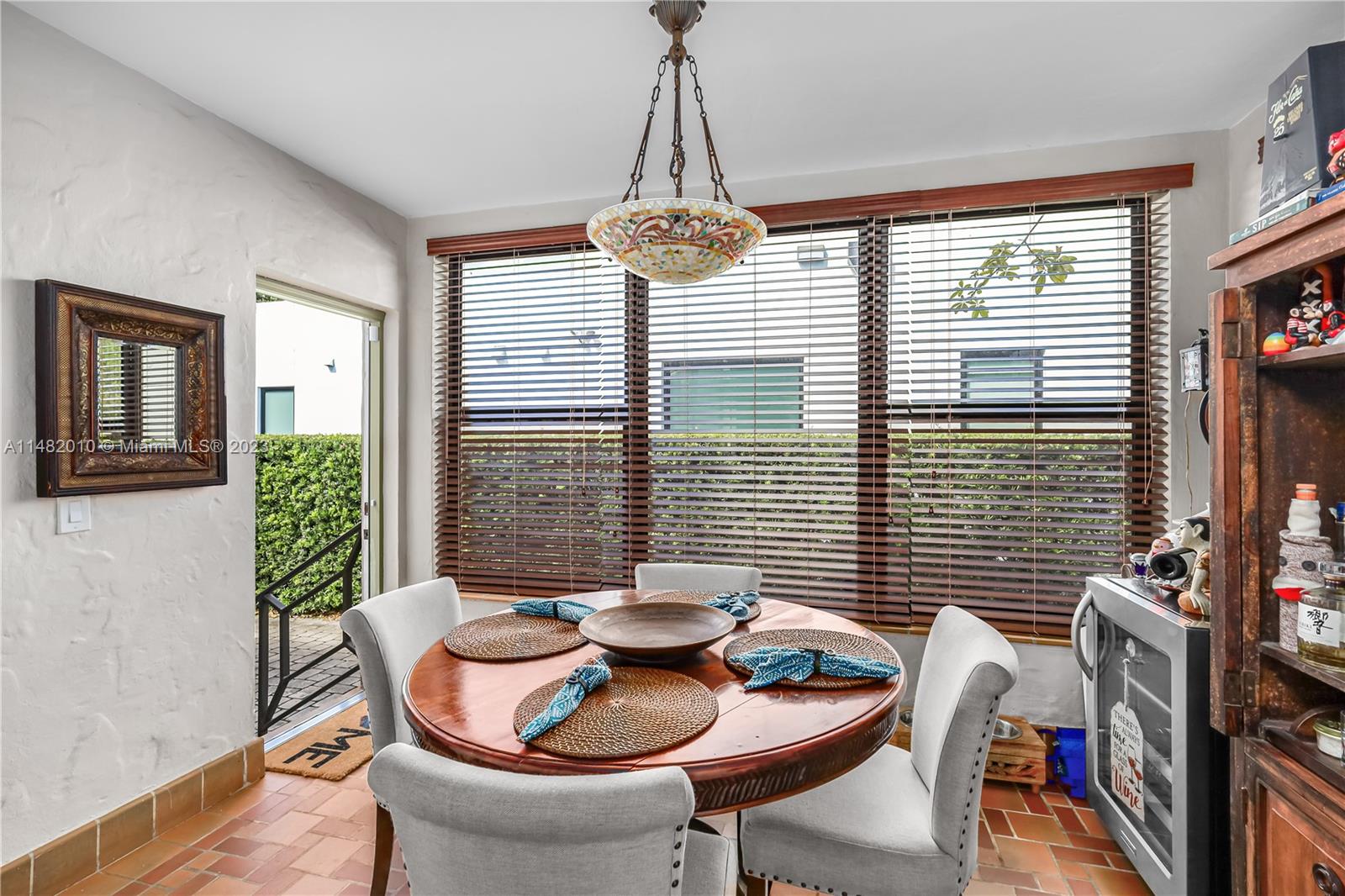 28 Southwest 26th Road Miami, FL 33129 - Photo 13 of 38 a dining room with furniture and window