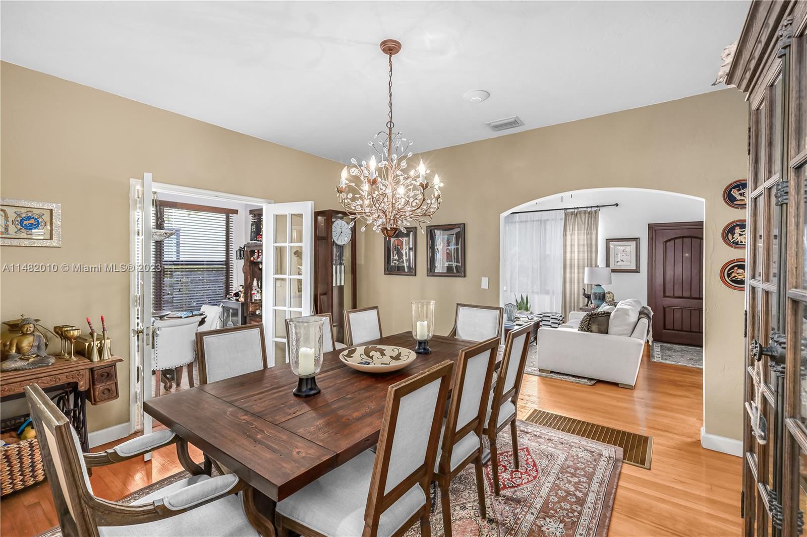 28 Southwest 26th Road Miami, FL 33129 - Photo 3 of 38 a view of a dining room with furniture window and wooden floor