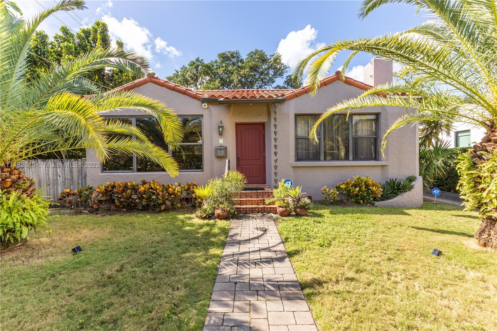 28 Southwest 26th Road Miami, FL 33129 - Photo 35 of 38 a front view of a house with garden