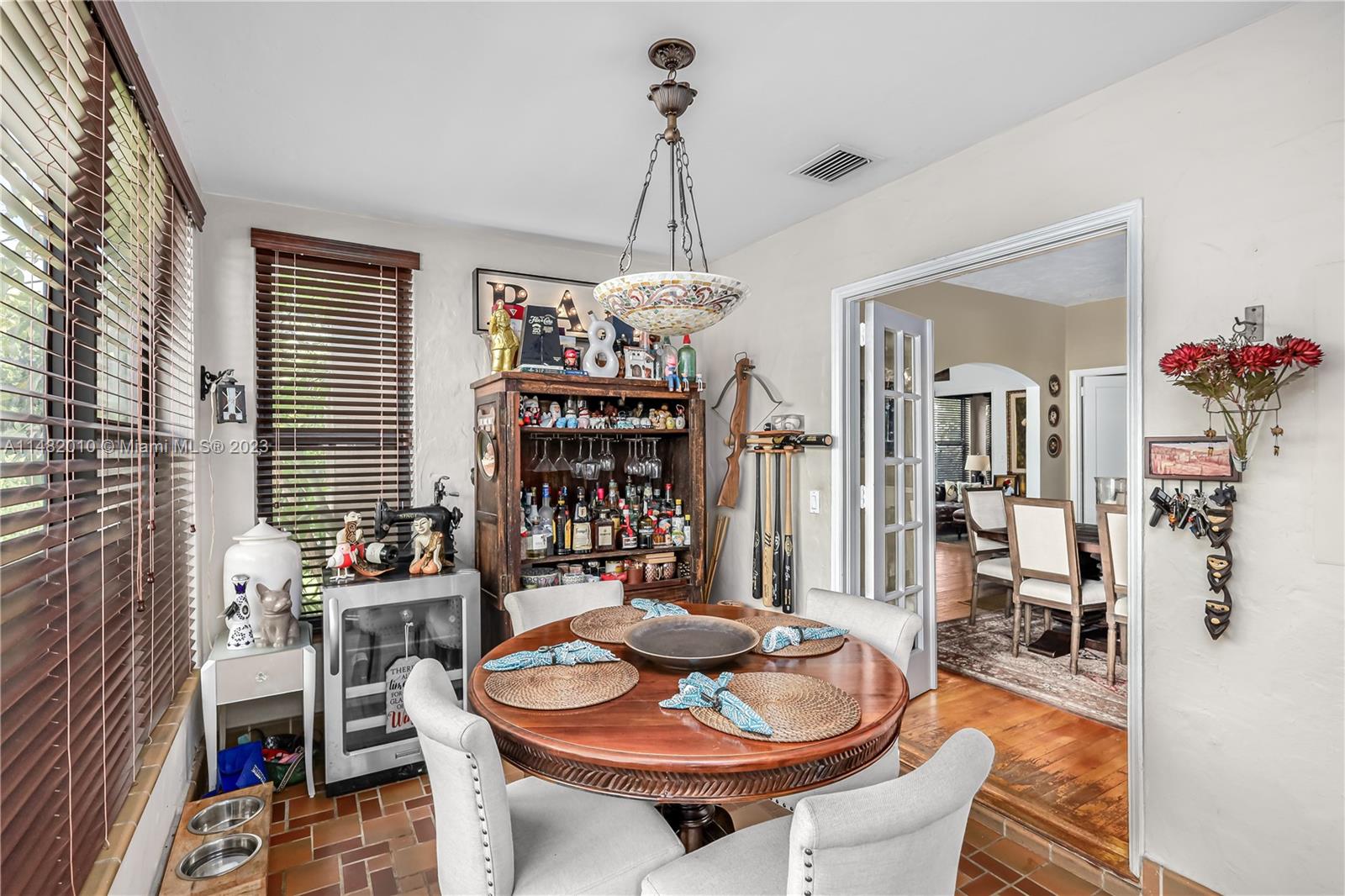 28 Southwest 26th Road Miami, FL 33129 - Photo 4 of 38 a dining room with furniture and window