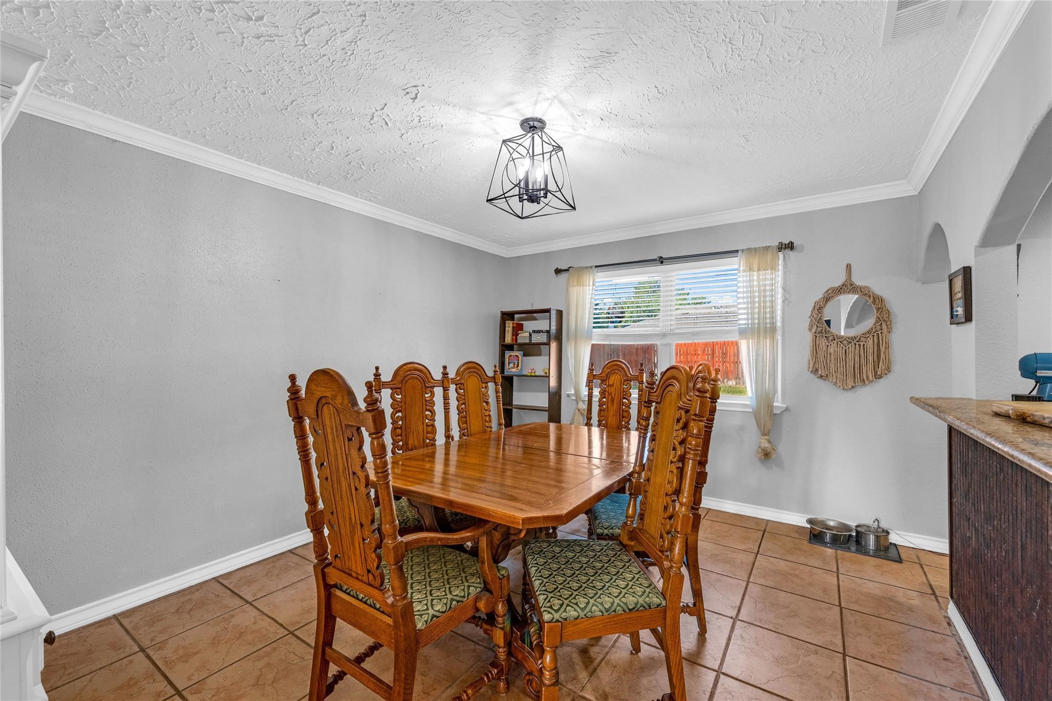 24014 Red Sky Drive Spring, TX 77373 - Photo 18 of 23 a dining room with furniture a chandelier and window