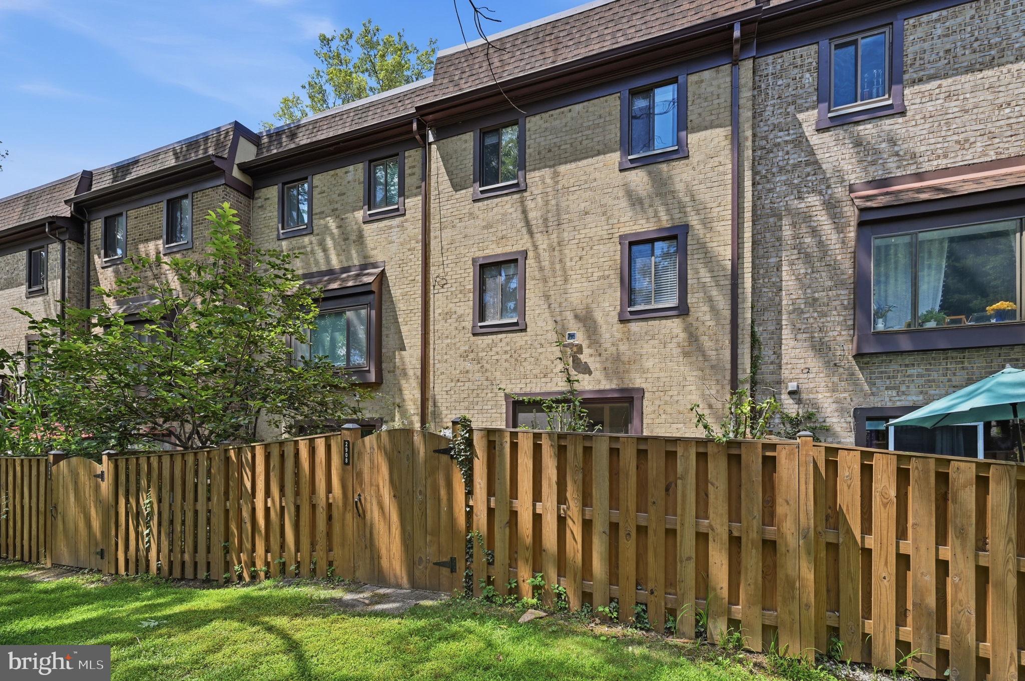 2908 Jermantown Road, Unit 24 Oakton, VA 22124 - Photo 69 of 74 Charming townhouse with lush greenery.