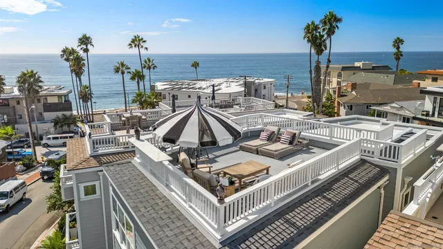 a view of a terrace with seating area and potted plants