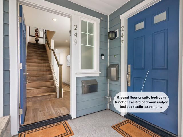 a kitchen with stainless steel appliances granite countertop a stove a microwave and a refrigerator