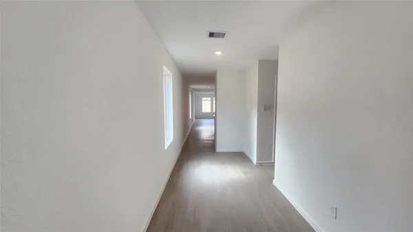 a view of an empty room with window