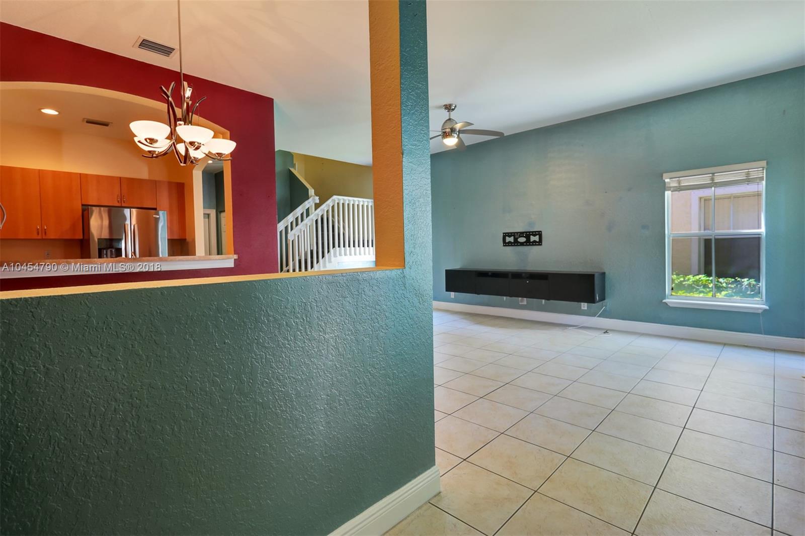 2127 Southwest 99th Way Miramar, FL 33025 - Photo 15 of 43 a view of a living room with a large window