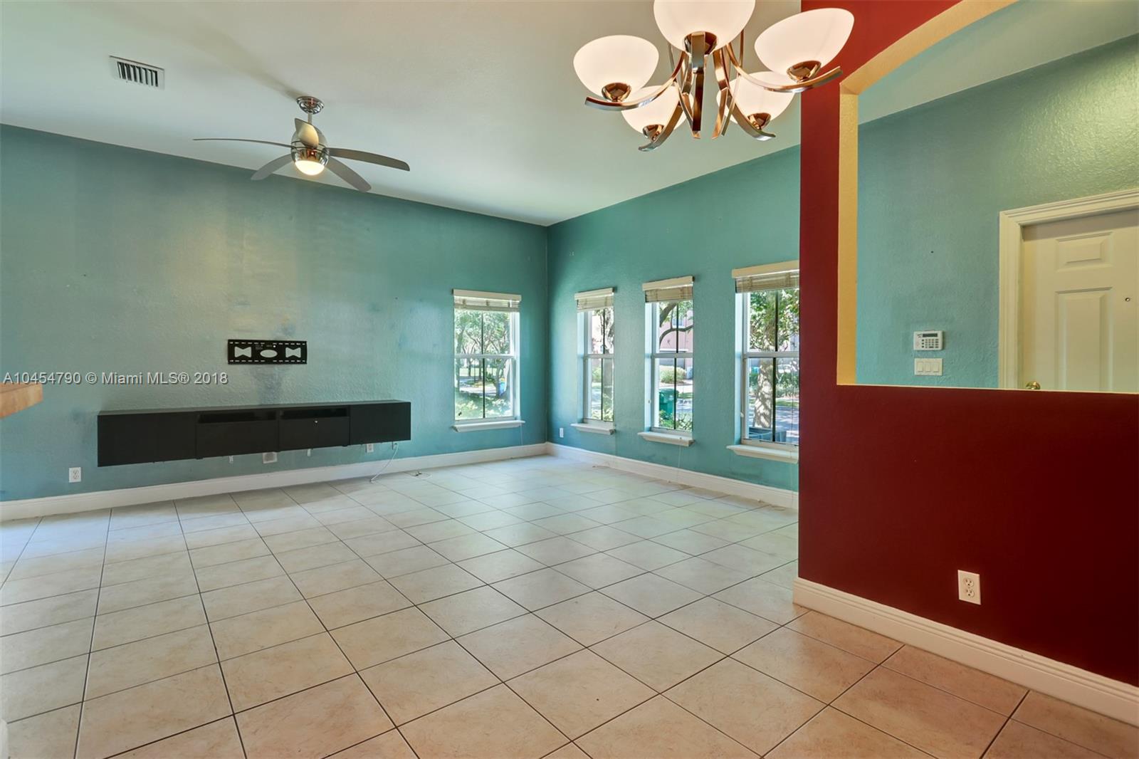 2127 Southwest 99th Way Miramar, FL 33025 - Photo 17 of 43 a view of livingroom with furniture and windows