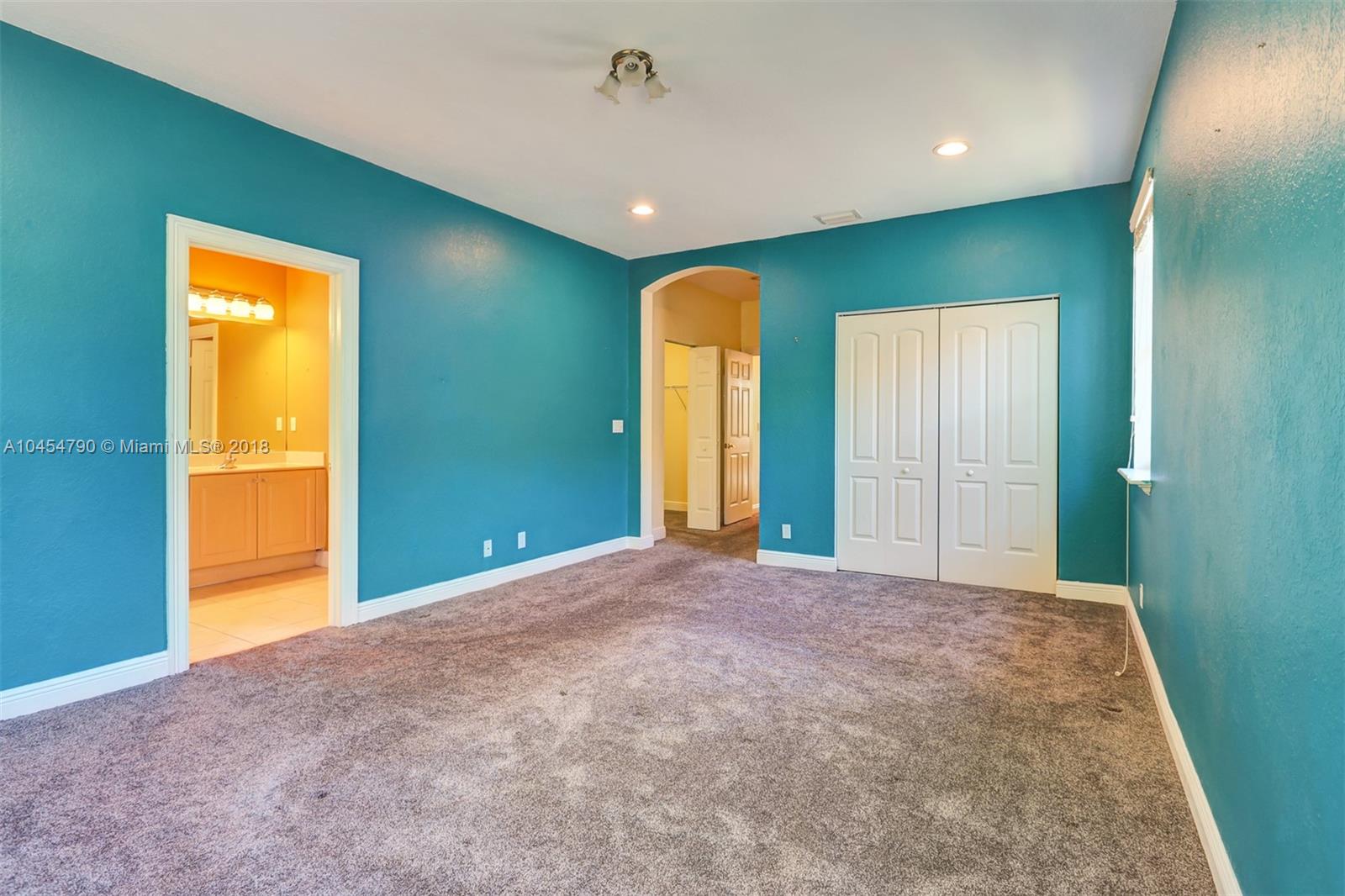2127 Southwest 99th Way Miramar, FL 33025 - Photo 20 of 43 a view of an empty room with a window