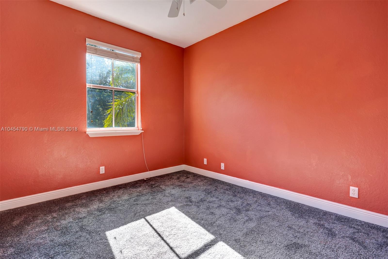 2127 Southwest 99th Way Miramar, FL 33025 - Photo 27 of 43 an empty room with windows