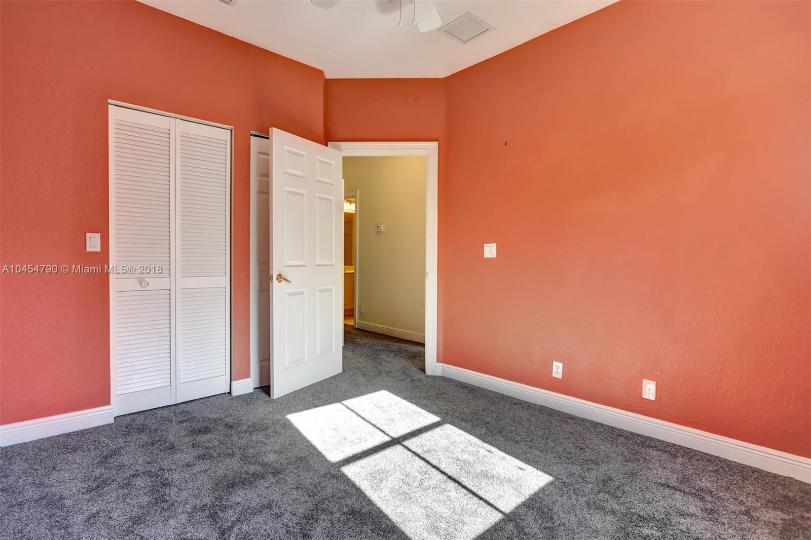 2127 Southwest 99th Way Miramar, FL 33025 - Photo 28 of 43 a view of an empty room with a window