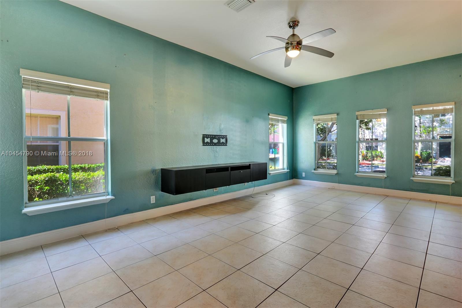 2127 Southwest 99th Way Miramar, FL 33025 - Photo 4 of 43 a view of an empty room with a window