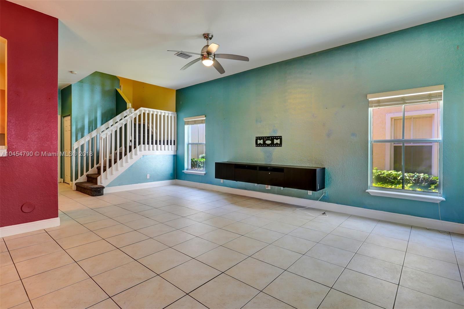 2127 Southwest 99th Way Miramar, FL 33025 - Photo 5 of 43 a view of an empty room with windows
