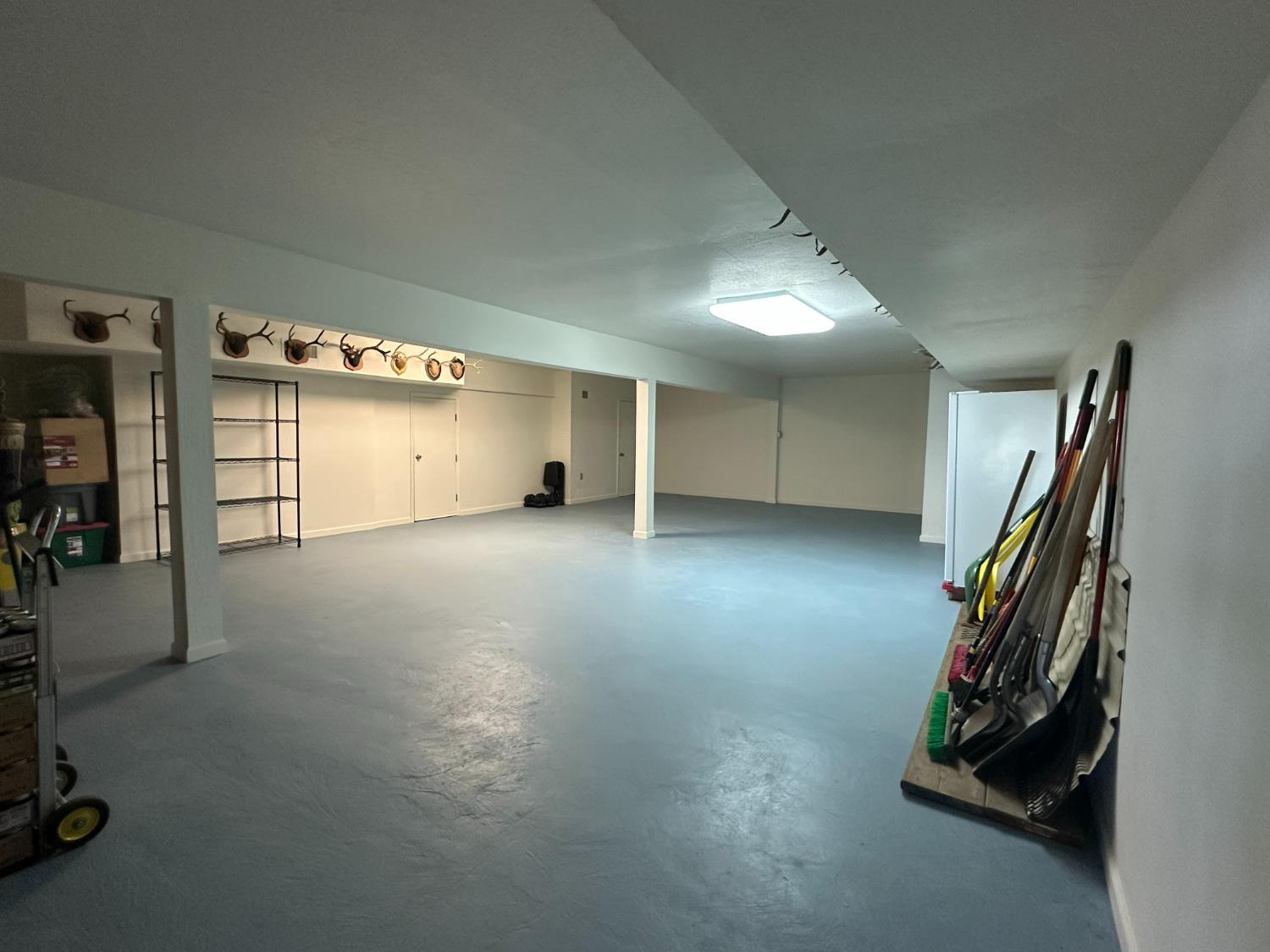 38303 Woodland Road Shaver Lake, CA 93664 - Photo 26 of 28 a view of a room with gym equipment