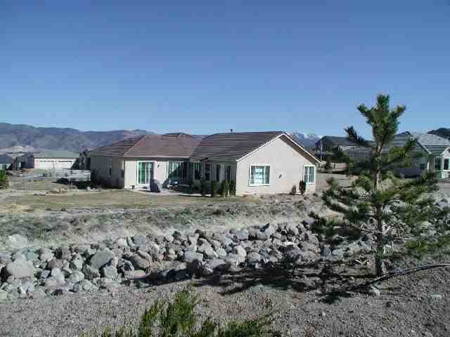 152 Mule Creek Circle Reno, NV 89511 - Photo 3 of 9 a view of a house with a yard