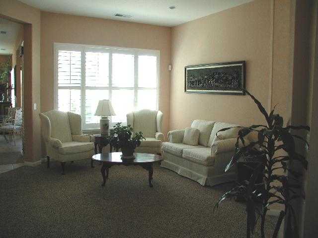 152 Mule Creek Circle Reno, NV 89511 - Photo 4 of 9 a living room with furniture and a large window