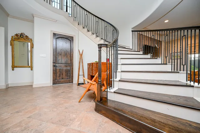 a view of a patio with a table and chairs