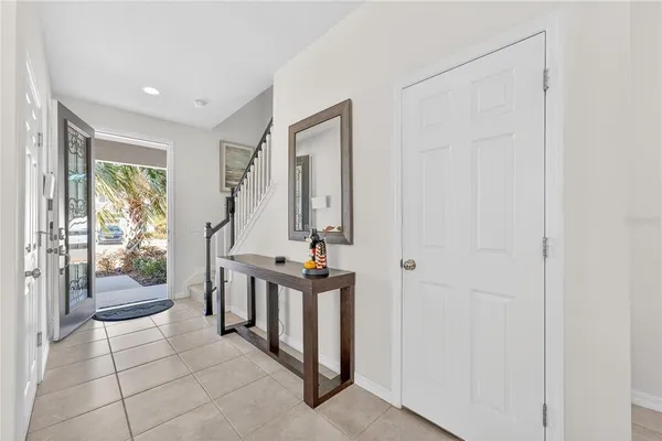 a view of a hallway with windows