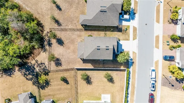 an aerial view of a city with lots of residential buildings