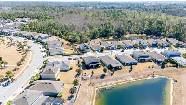an aerial view of residential house with outdoor space