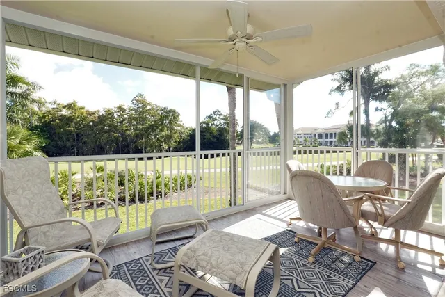 a living room with large windows