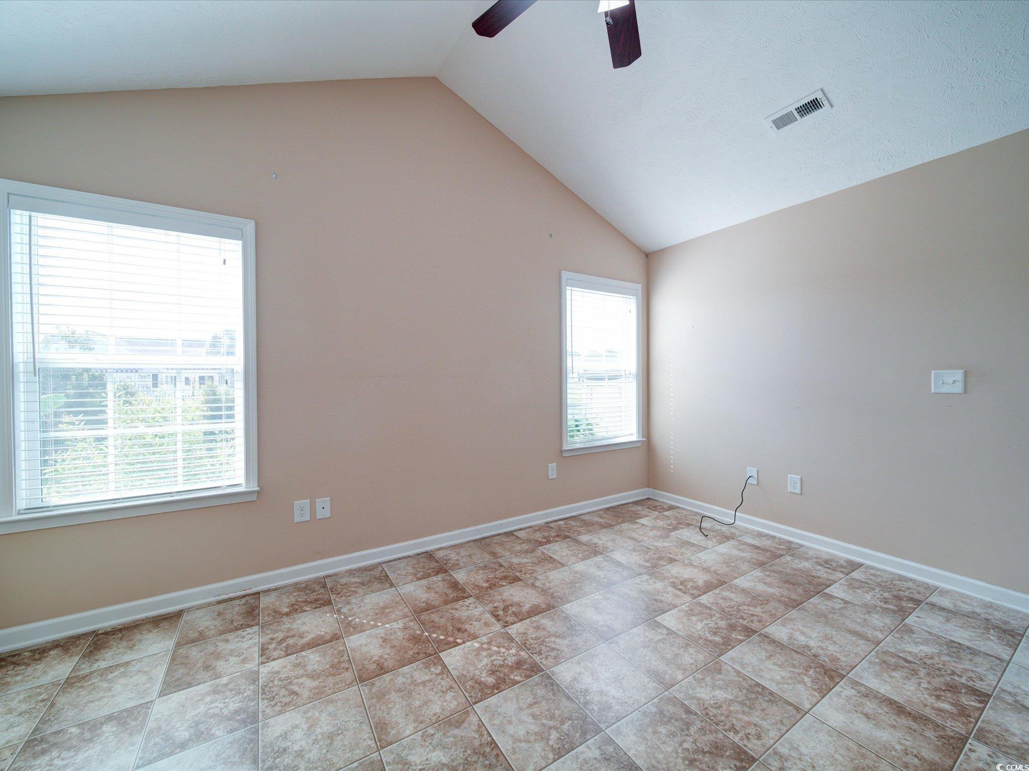 708 Shenanigan Loop Murrells Inlet, SC 29576 - Photo 15 of 20 Unfurnished room featuring vaulted ceiling and cei